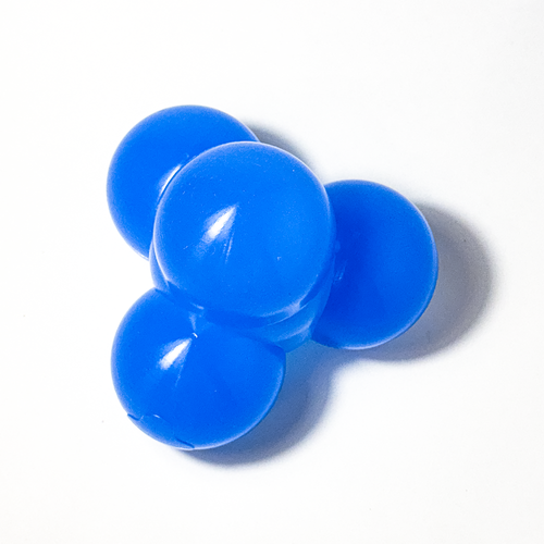 Small, solid blue silicone structure comprised of four circular nodes, viewed from the top