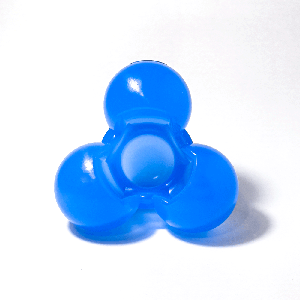 Small, solid blue silicone structure comprised of four circular nodes, viewed from the bottom